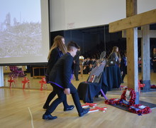 Students laying wreaths