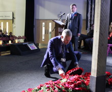 Dr Pawson laying wreath